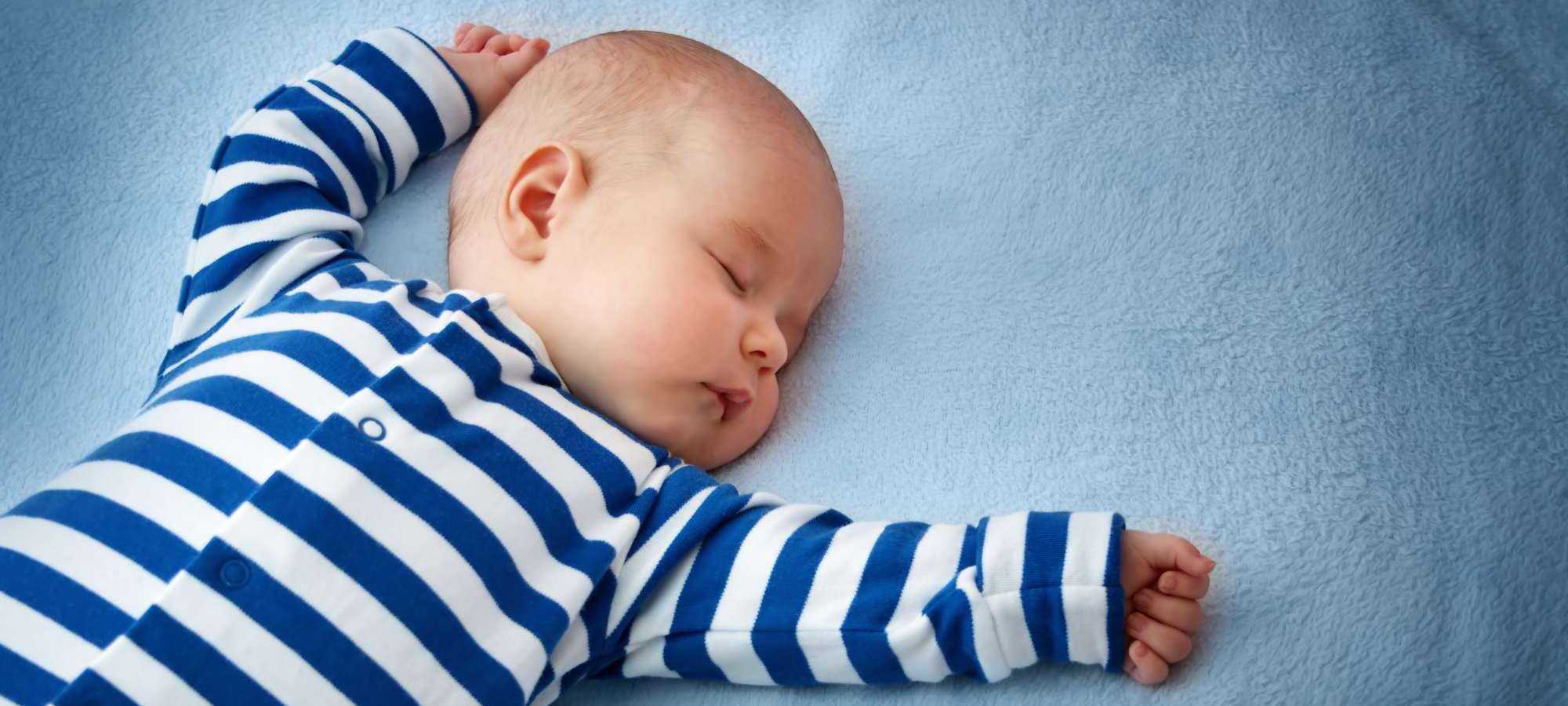 Baby laying on blanket